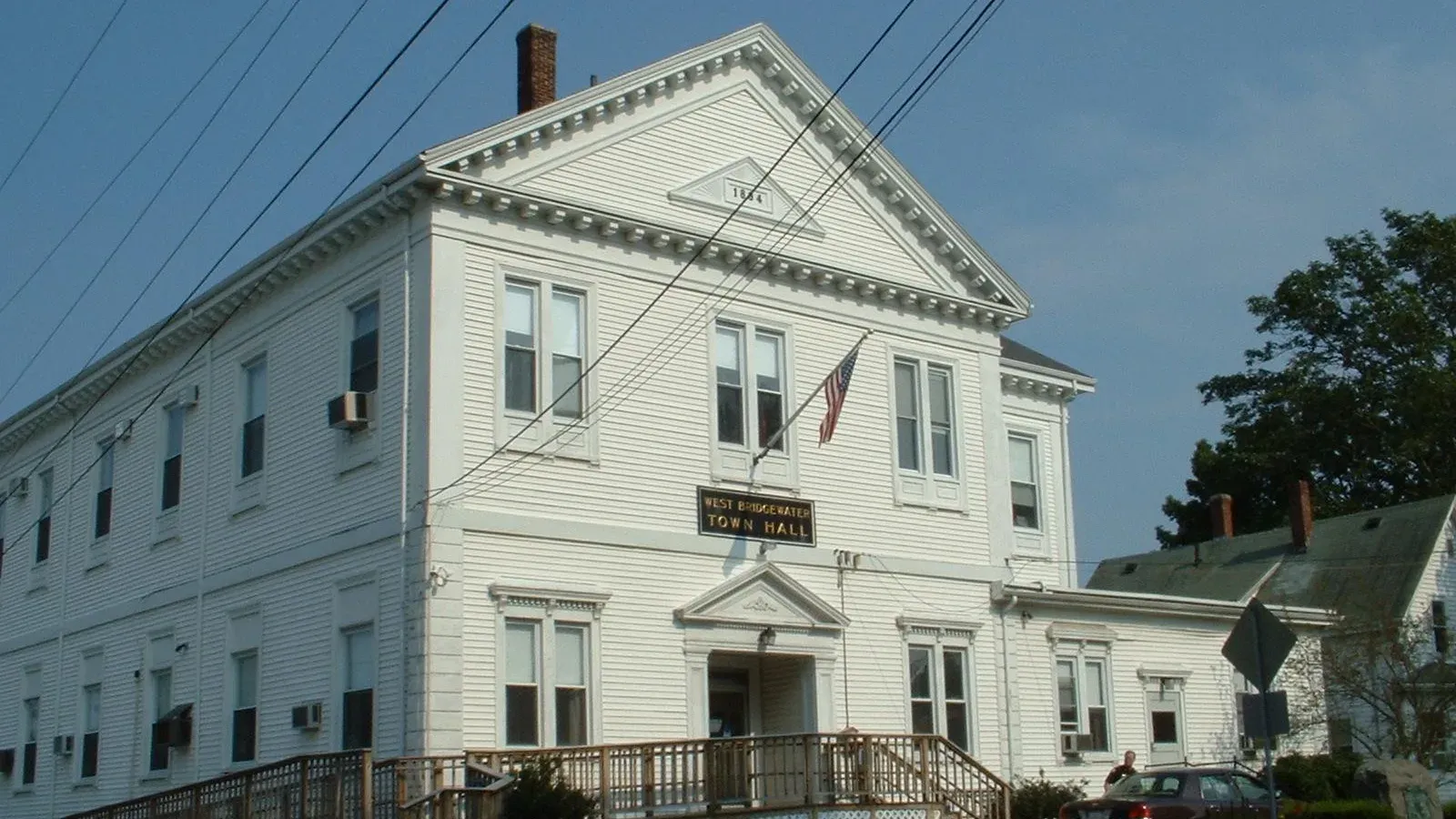 West Bridgewater Town Hall, a white clapboard Greek Revival building with a pedimented gable, West Bridgewater, Massachusetts